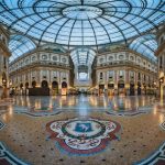 MILAN, ITALY - JANUARY 13, 2015:  Famous Bull Mosaic in Galleria Vittorio Emanuele II in Milan. It's one of the world's oldest shopping malls, designed and built by Giuseppe Mengoni between 1865 and 1877.