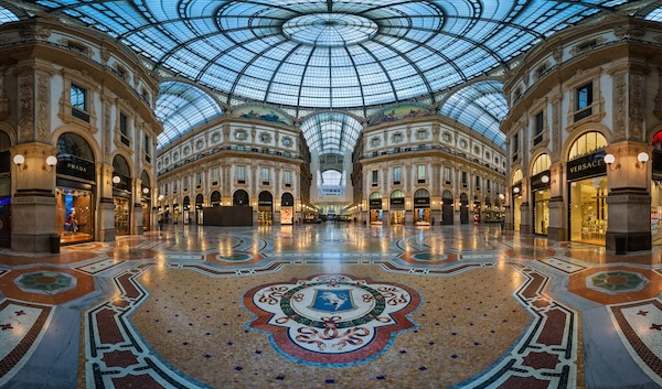 MILAN, ITALY - JANUARY 13, 2015:  Famous Bull Mosaic in Galleria Vittorio Emanuele II in Milan. It's one of the world's oldest shopping malls, designed and built by Giuseppe Mengoni between 1865 and 1877.