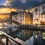 Bridge across the Naviglio Grande canal at the evening in Milan, Italy